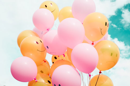 smiley face balloons - Photo from Unsplash.com