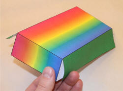 Fold the panels of the large template and glue the tabs.
